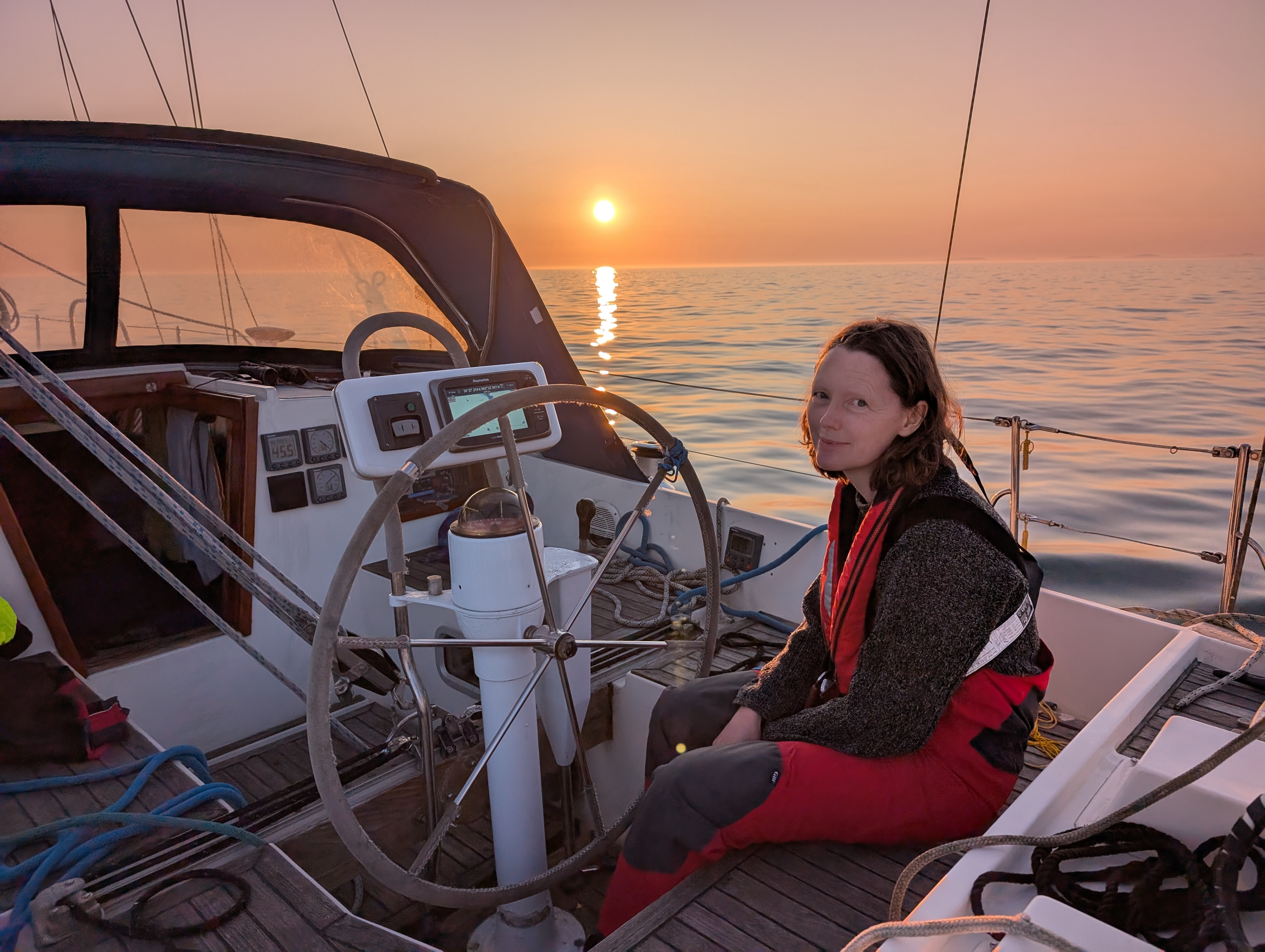 Sunset on the smooth waters of Lyme Bay